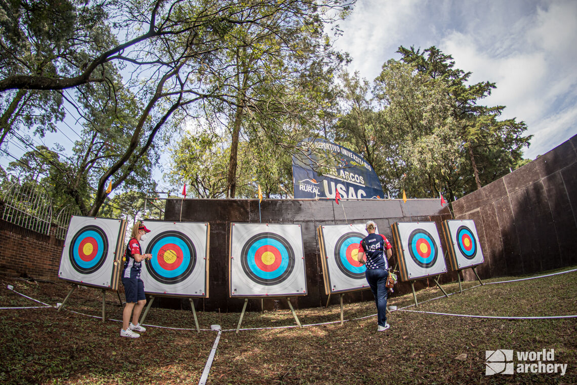 Casey Kaufhold and Mackenzie Bronze at the targets on the practice range during the first stage of the 2021 Hyundai Archery World Cup in Guatemala City.