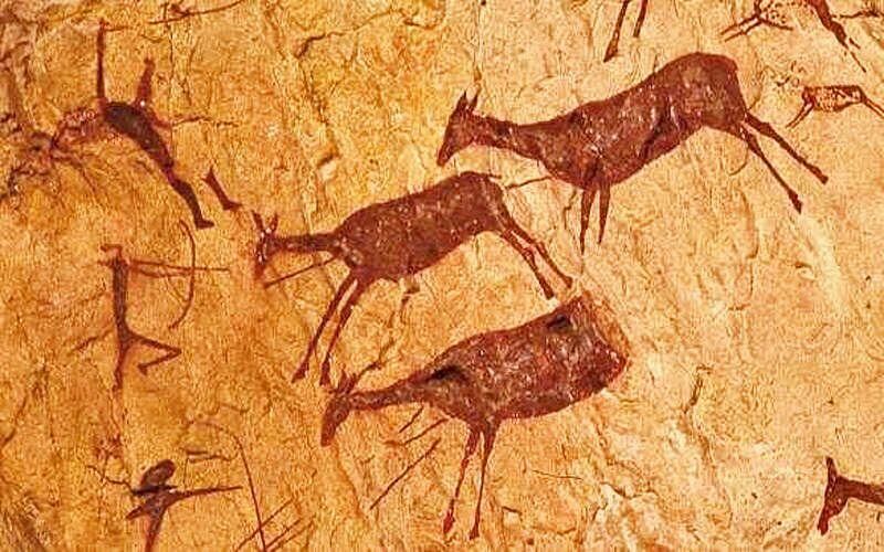 Cave paintings of archery dating back 10s of 1000s of years.
