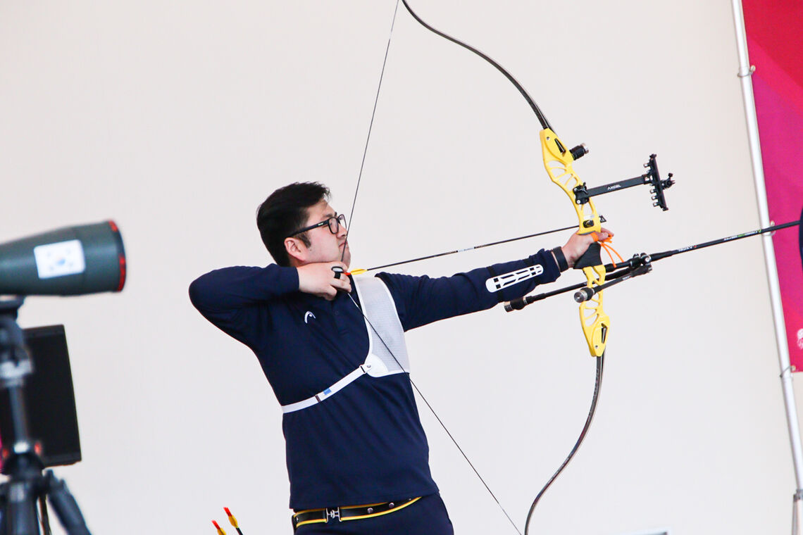 Kim Woojin shoots during Korea’s simulation competition ahead of Tokyo 2020.