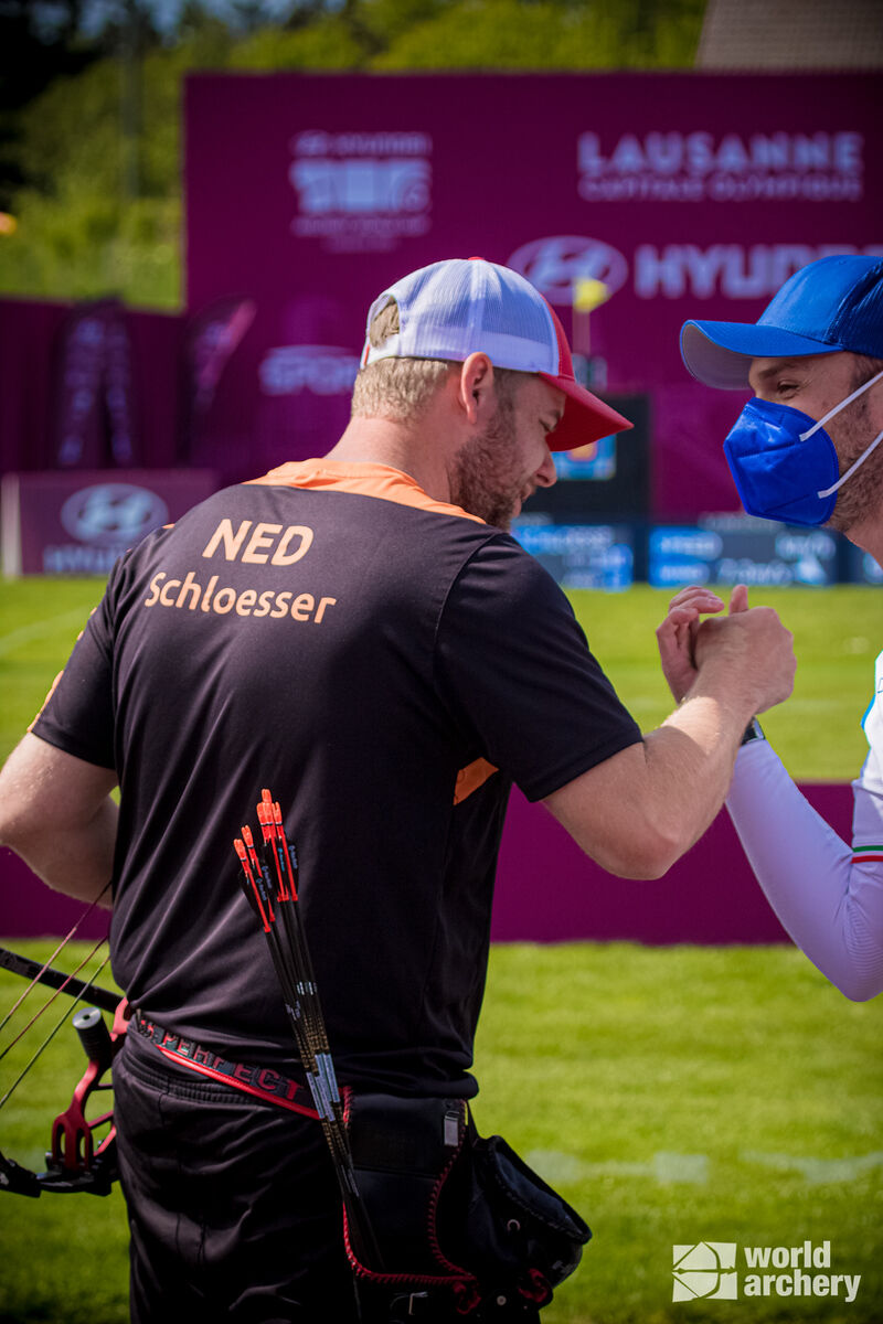 Federico Pagnoni congratulates Mike Schloesser on winning the second stage of the Hyundai Archery World Cup in 2021.