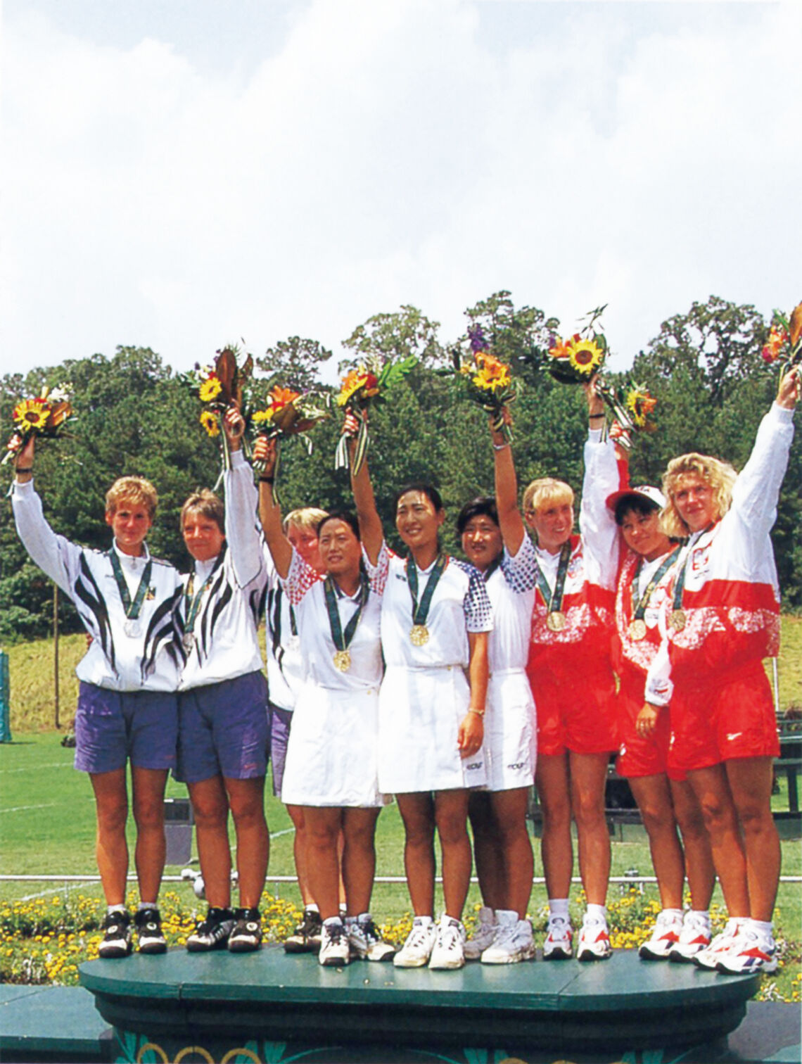The Korean women’s team on the podium at the 1996 Olympics.