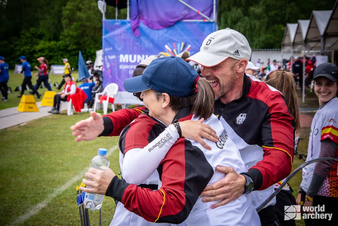 The German team celebrates two recurve women in the final four.