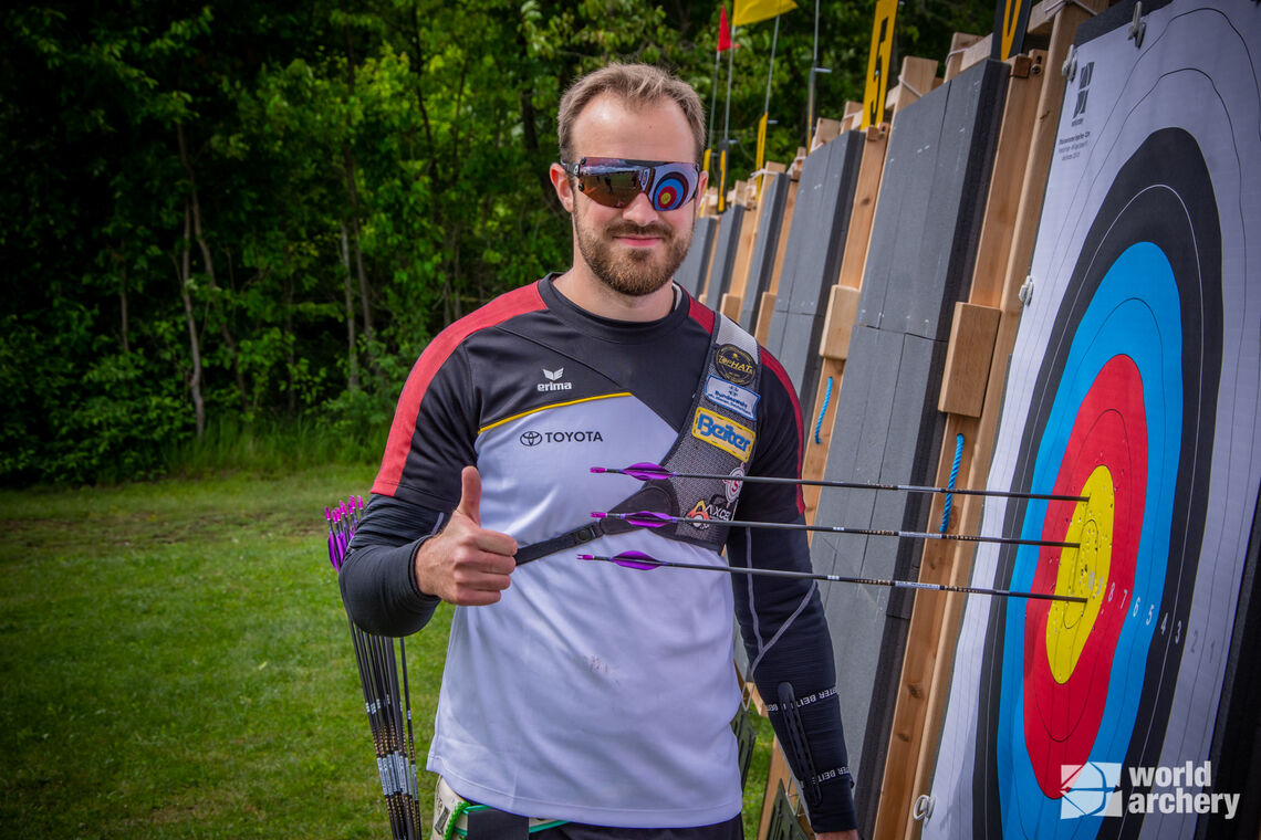 Florian Unruh celebrates making the recurve men's individual gold medal match at Munich 2022