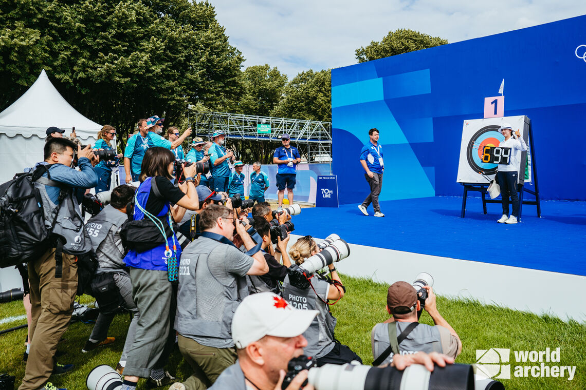 Lim Sihyeon celebrates a new world and Olympic record at the target.