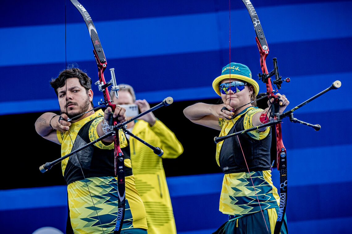 Peter Boukouvalas shooting with Australian mixed teammate Laura Paeglis.