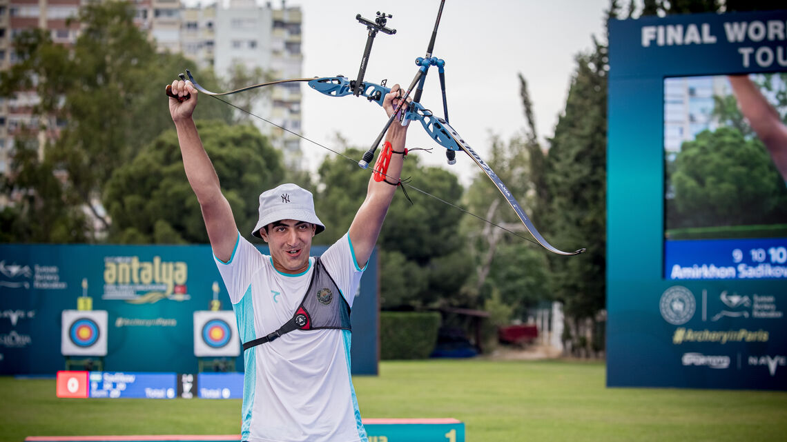 Amirkhon Sadikov celebrates Uzbekistan’s first-ever Olympic quota.