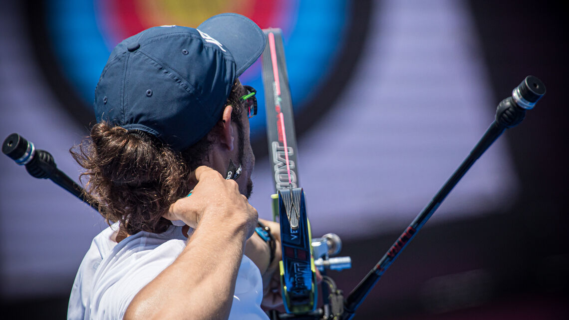 Itay Shanny shoots at the Tokyo 2020 Olympic Games.