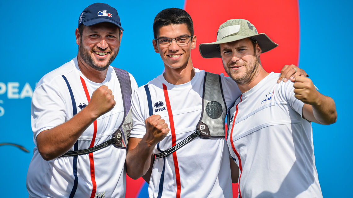 The French recurve men celebrate winning team gold at the European Games in 2019.