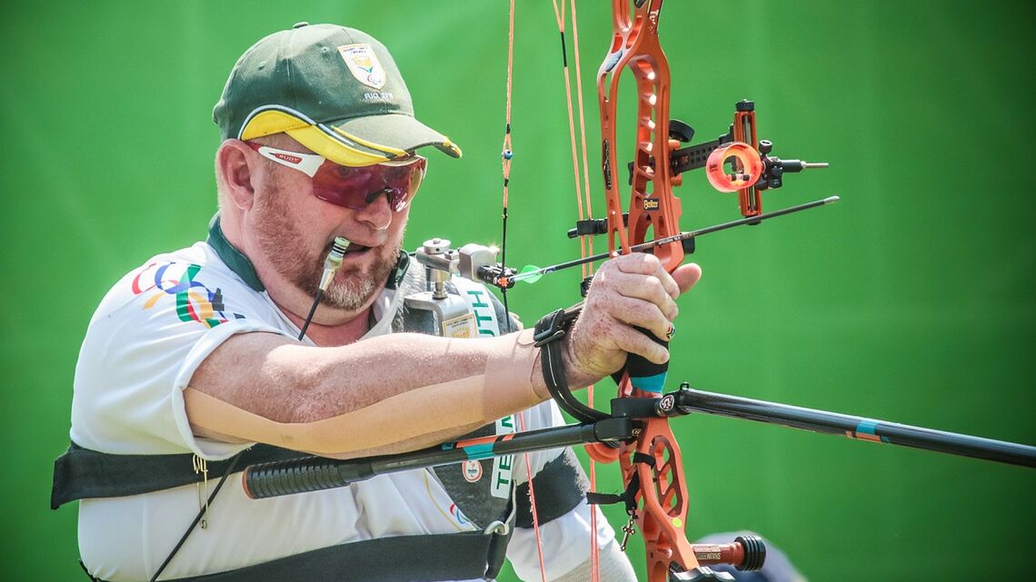 Shaun Anderson loads his bow at the Rio 2016 Paralympic Games.