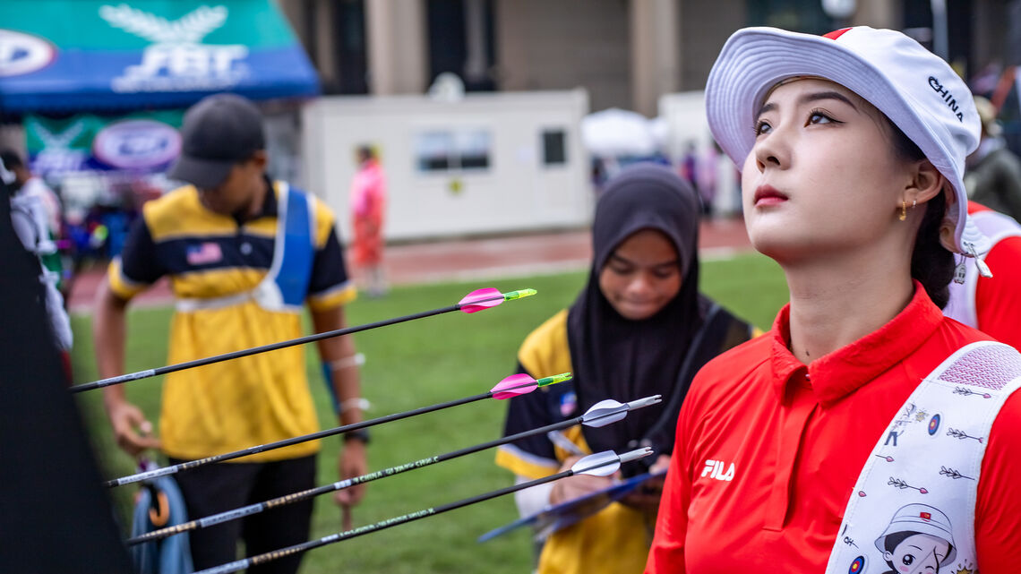 Chinese recurve archer looking up