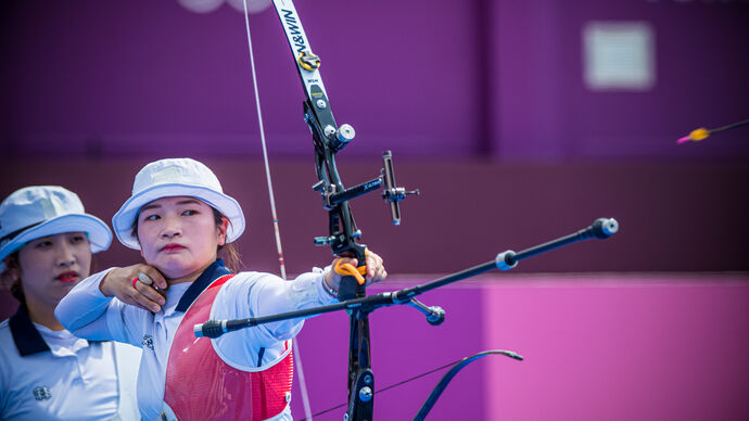 Kang Chae Young shoots during the women’s team finals at the Tokyo 2020 Olympic Games.