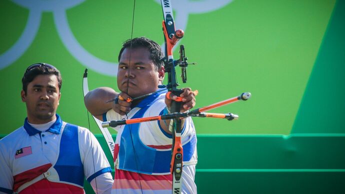 Haziq Kamarrudin shoots during the Olympic Games in 2016.