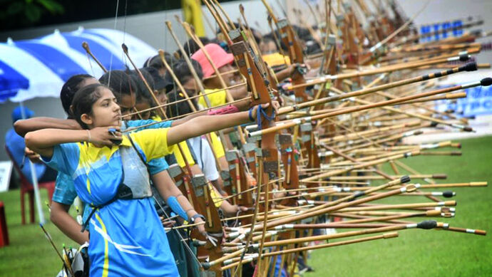 Archers shoot bamboo bows during the Indian round at the national championships.