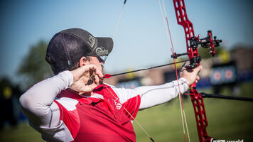 Chris Perkins shoots at the Yankton 2021 Hyundai World Archery Championships.
