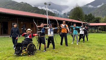 Coach Sally with the Bhutan national archery team.